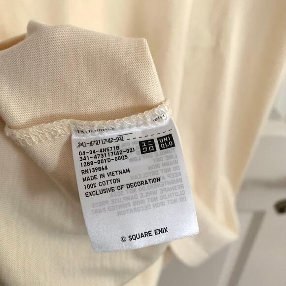 Uniqlo Final Fantasy 14 FFXIV Chocobo Moogle Fat Cat Pocket T-shirt in Natural - Picture 11 of 12